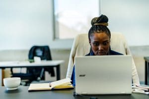 Sexual Assault Therapist Working On Laptop